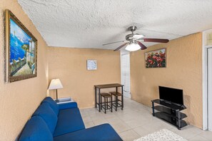Furniture, Indoors, Living Room, Screen, Couch