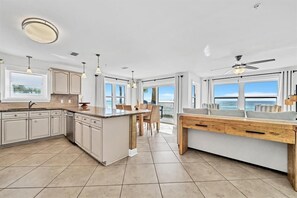 Windows abound in the beautiful space -- beach views are all around!