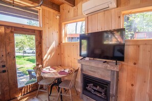 Dining space and mini-split unit will keep you warm or cool year-round...