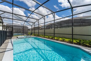 Pool area showing backyard fence.