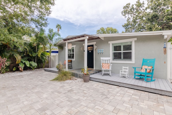 Beach cottage with front porch and rocking chairs