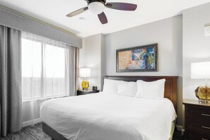 Primary Bedroom features a comfortable king bed and flat screen TV.