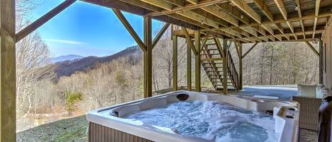 Soak in 4-person hot tub after a long day of fun, sight seeing in town, or hiking!