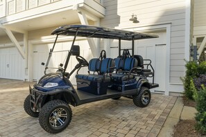 6 Seater Golf Cart Included with Your Rental!