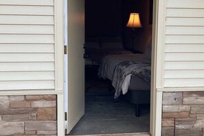 The Garage was converted into a cute bunkhouse style bedroom with an exterior door entrance.