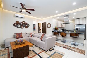 Living Room and Kitchen.