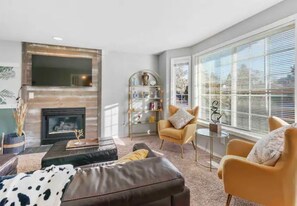 Living area with decorative fireplace