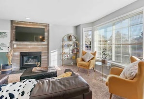 Living area with decorative fireplace