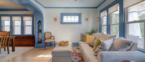 The open, airy layout effortlessly flows into a spacious dining room.