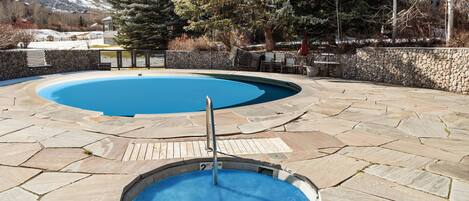The hot tub is open during the winter & summer seasons with a great view of the ski area and is just steps from your vacation rental.  Pool is summer