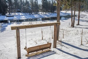 Wooden Swing on a Porch