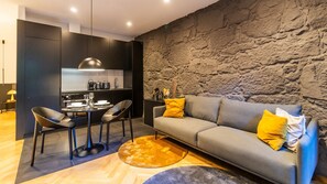 Full layout of the main area of the apartment: an open space that effortlessly connects the living room, the dining area and the kitchenette #contemporary #wonderful