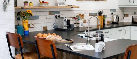 breakfast bar with comfy support back stools.