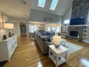 Great room; one of (three) dining areas in background
