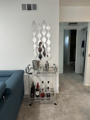 Living room bar. Bring a bottle or two!