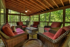 Screen porch of main living area - grill and hammock