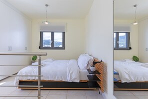 View of the master bedroom from the ensuite bathroom entrance.