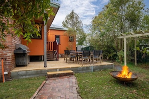 Soak up the crisp country air from the backyard, replete with alfresco dining, a BBQ and a fire pit.