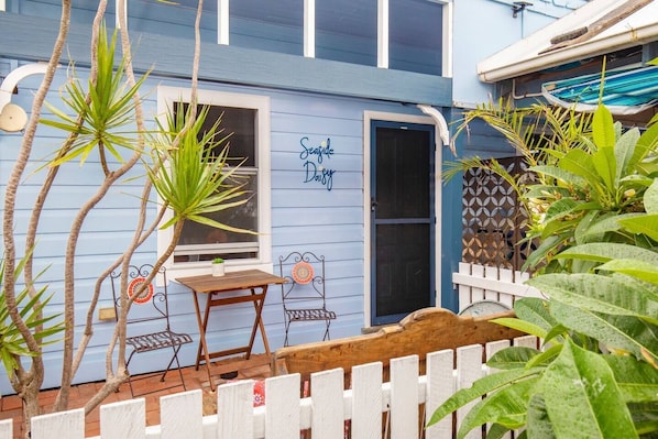 Sip your morning coffee out in the sunshine. This charming cottage is guaranteed to impress.
