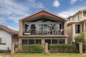 Parallel to the water's edge, the home is split across two levels carefully set to ensure that the 180-degree sea views are maximised from all rooms.