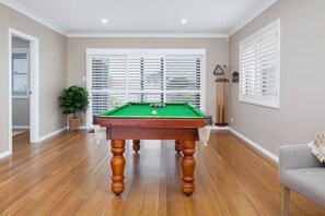  A dedicated pool room creates fun for families or group getaways.