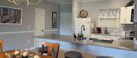 Beautiful table and new kitchen.