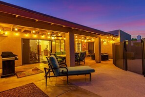 Cover patio space with bistro lights, ceiling fans, bbq, lounger and dining table for 6.