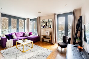 Living Room with Private Balcony
