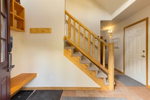 Entryway and stairwell to second floor