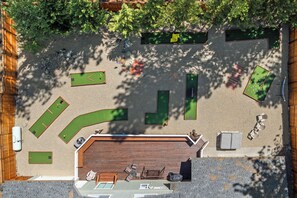 Large back deck and fenced in back yard, BBQ and Mini Golf Course.