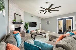 Stretch out on the cushy sectional couch in the living room where you’ll have access to a fireplace and an HDTV for family movie night!