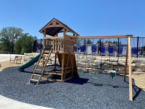 Kids playground area steps from the house inside RockyTop Branson near the pool!  Enjoy!