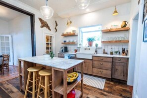 Coffee, tea or wine, anyone? This kitchen provides the perfect ambiance. 