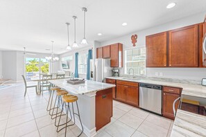 Enjoy a modern kitchen equipped with stainless steel appliances, perfect for effortless cooking and dining