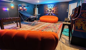 Arcade classics, basketball hoops, foosball and retro seating., Designed for FUN