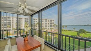 Enclosed balcony with windows that open for fresh breeze.