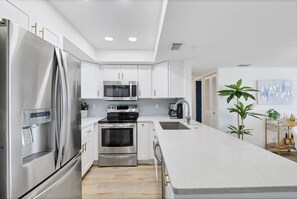 Stainless steel appliances. Gorgeous countertops.