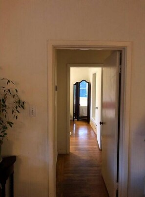 Hallway to master bedroom and bath