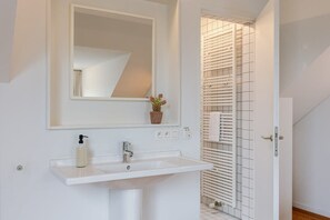 Bathroom with sink and shower