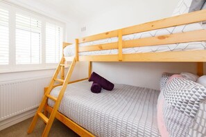 The second bedroom has a triple bunk, with a single over double, perfect to sleep 3 children or a second couple.