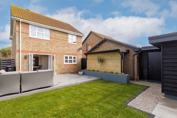 Modern and stylish home in Bracklesham Bay; a perfect family seaside escape with garden, patio and garden office.