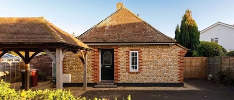 Welcome to Seaton, a quaint flint cottage in the seaside village of West Wittering.