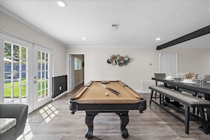 Full-size pool table included.