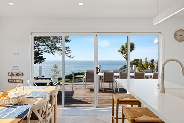 Sunlit Beachfront Retreat with Stunning Ocean Views