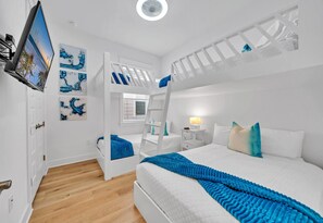 Our custom built bunk room is always a fave.  TV's are included in every bedroom