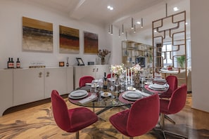 Focus on the elegant glass dining table (seats 8)