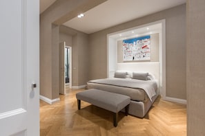Master bedroom with double bed and en-suite bathroom with walk in shower