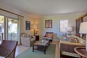 The tastefully curated art selection and Hawaiiana style furniture will make you feel right at home in your private retreat! The jalousie windows and screen door on the lanai help let the cool tropical breezes into the space as well.