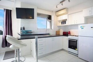 The kitchen has all the essentials you need to prepare meals at home.