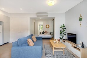 The living room sofa can be transformed into a pull-out bed to sleep an additional two adults comfortably.
